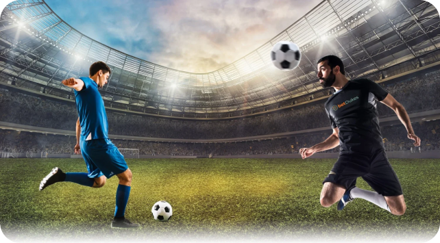 Two soccer players in blue and black kits competing for the ball in a dramatic floodlit stadium